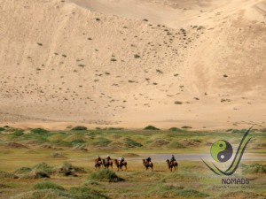 Camel riding in Khongor Sand Dunes
