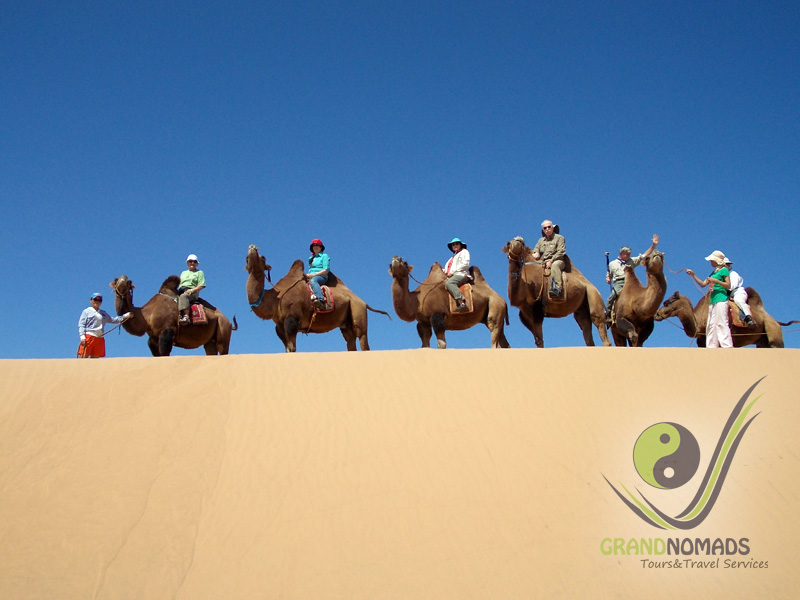 Khongor Sand Dunes, camel riding. 